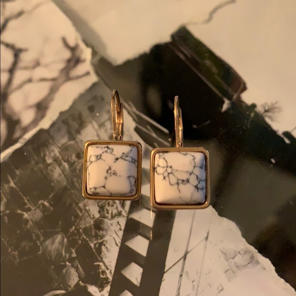 Thirty-one marble and gold earrings